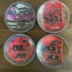 Set of 4 African Soapstone bowls, giraffe, rhino, elephant